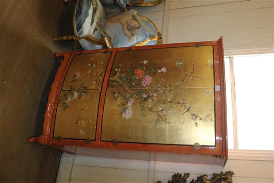 Bow fronted cabinet with Oriental decoration